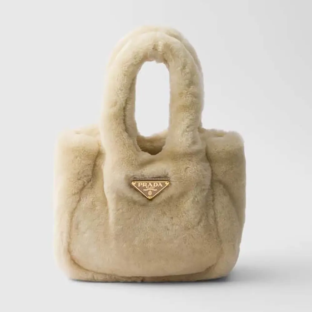 Front view of Prada Women Shearling Mini Handbag-Beige highlighting leather trim