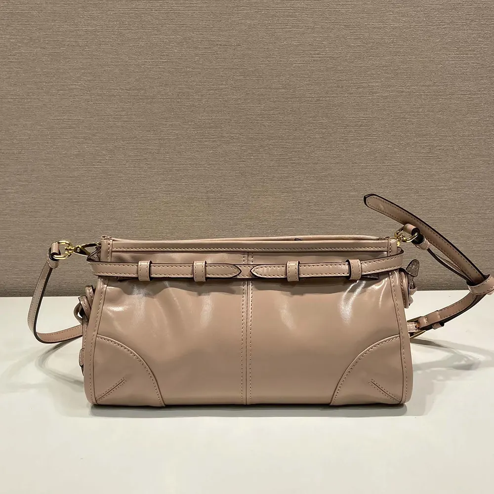 Side angle showing adjustable strap on Prada Women Small Leather Shoulder Bag-Pink