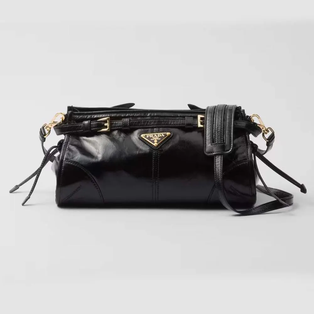 Front angle of Prada Women Small Leather Shoulder Bag-Black showing flap