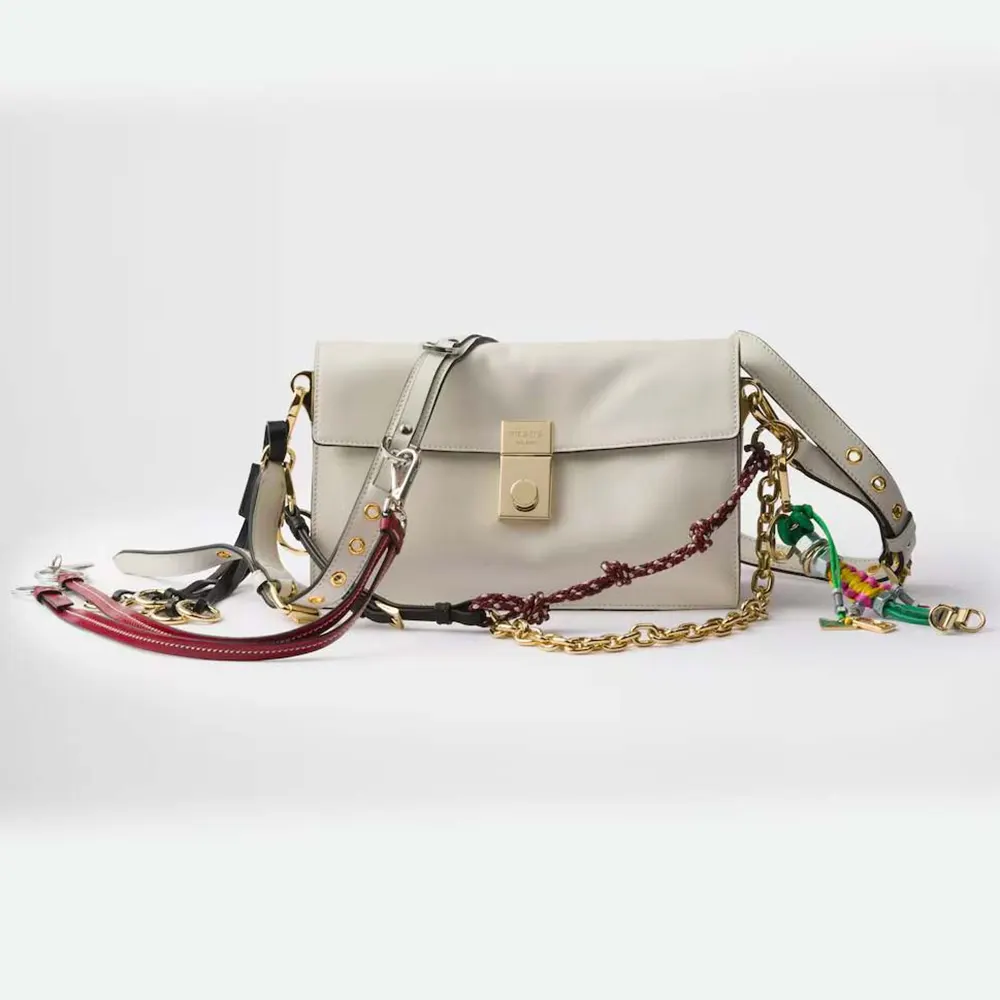 Front view of Prada Women Soft Sound Small Leather Shoulder Bag with Charms-White