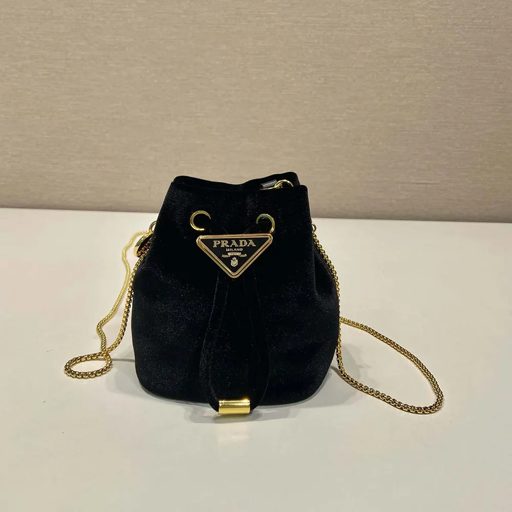 Close-up detail of gold-tone closure on Prada Women Velvet Mini Pouch-Black