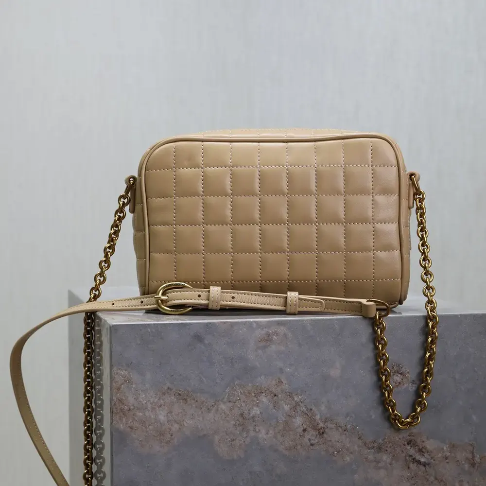 Side angle showing adjustable shoulder strap on Saint Laurent YSL Cassandre Camera Bag