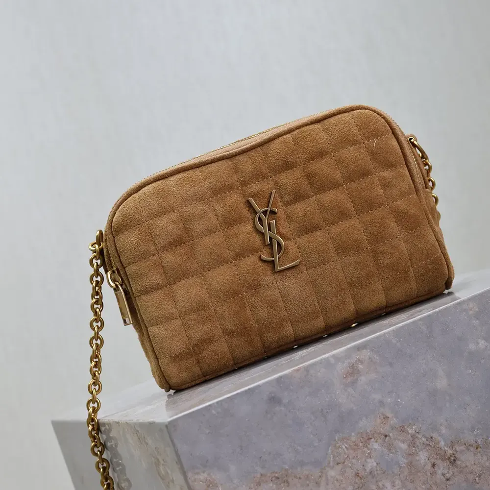 Side angle showing magnetic flap closure on Saint Laurent YSL Cassandre Camera Bag