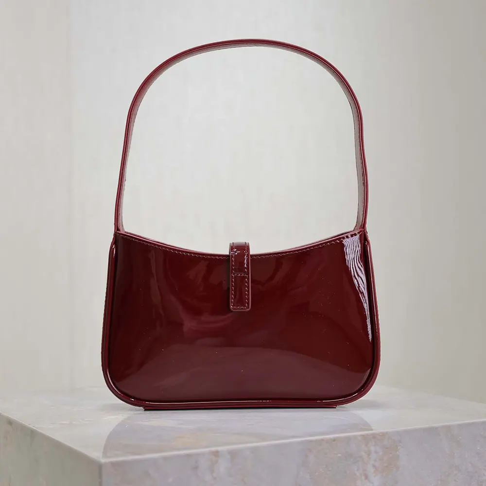 Side angle showing the compact silhouette of Saint Laurent YSL Women Mini Le 5 à 7