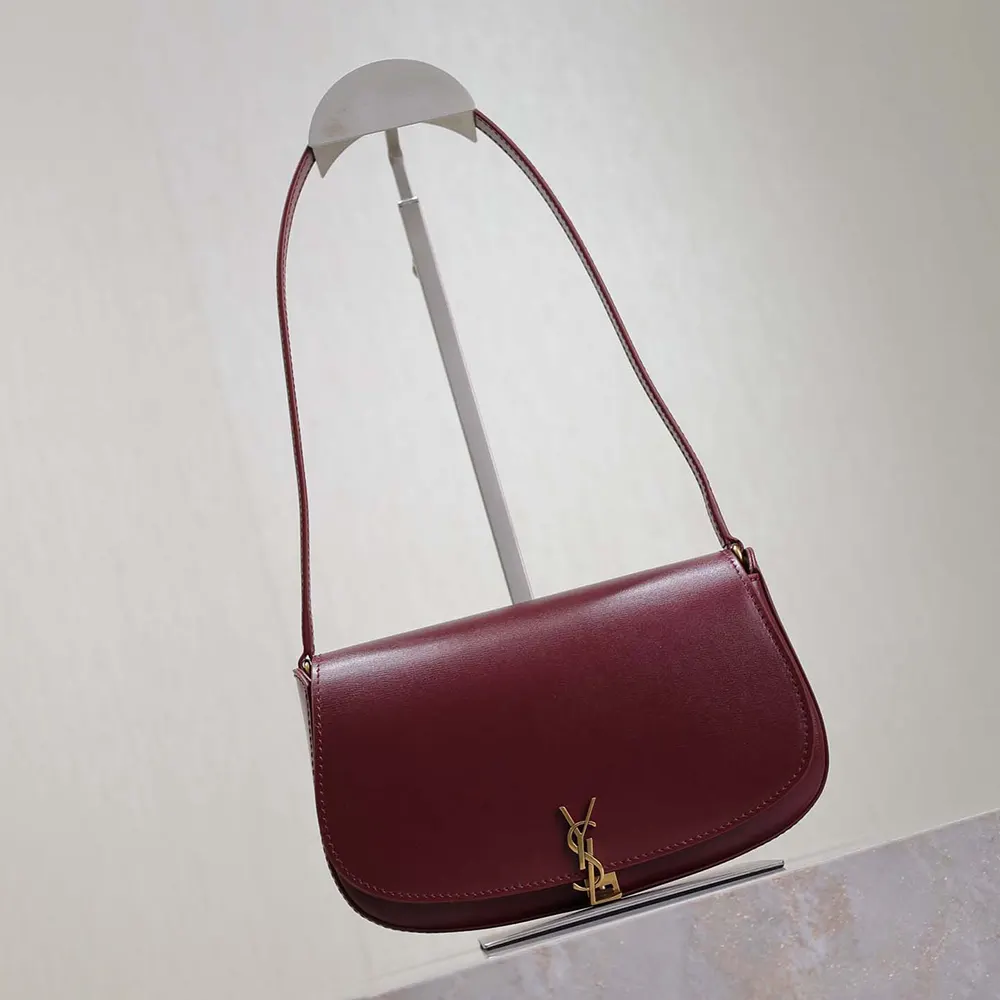 Side angle showing texture of Bordeaux box leather on Saint Laurent YSL Mini Voltaire