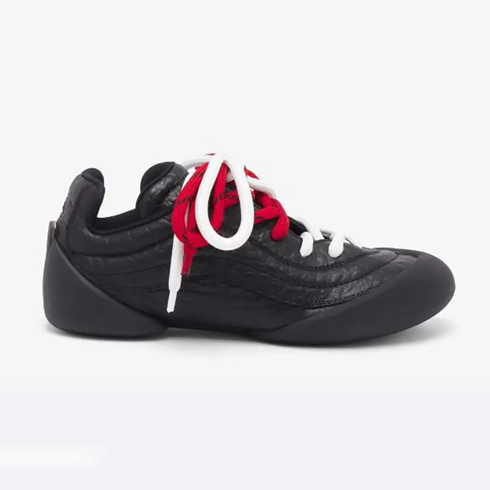 Side profile of Alexander Mcqueen Unisex Flexion Sneaker in Black