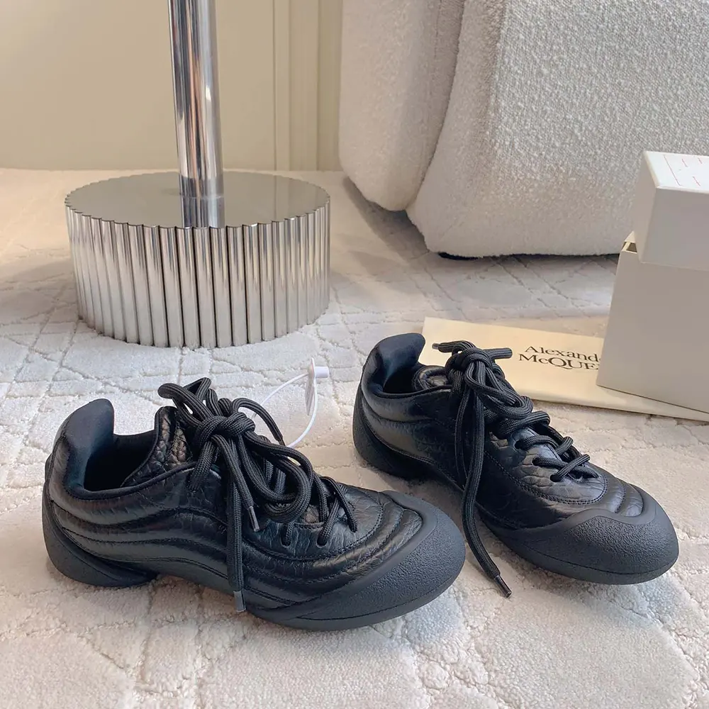 Top view showing laces and platform sole on Alexander Mcqueen Flexion Sneaker