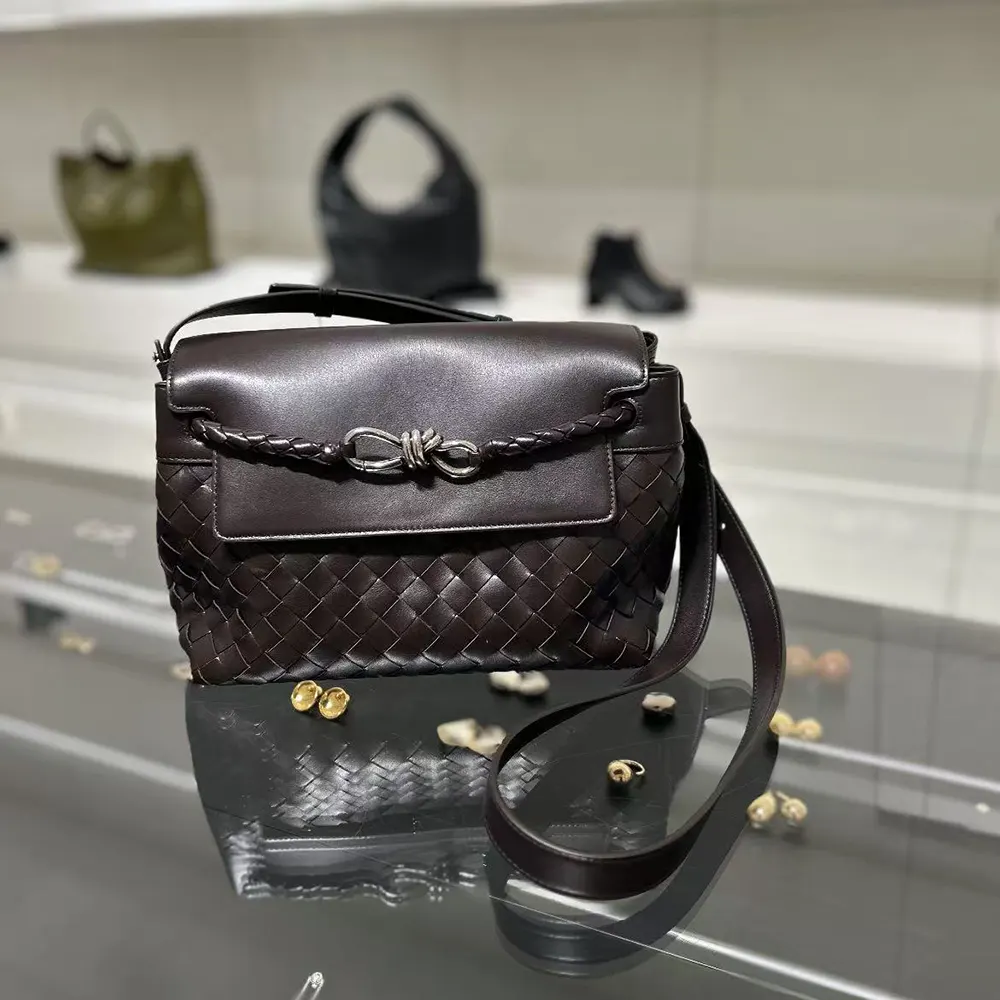 Side view showing adjustable strap of Bottega Veneta Small Andiamo Messenger