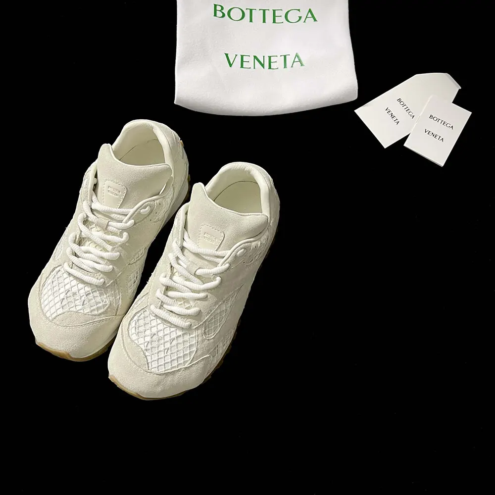 Close-up of white suede and signature knot detail on Bottega Veneta sneaker