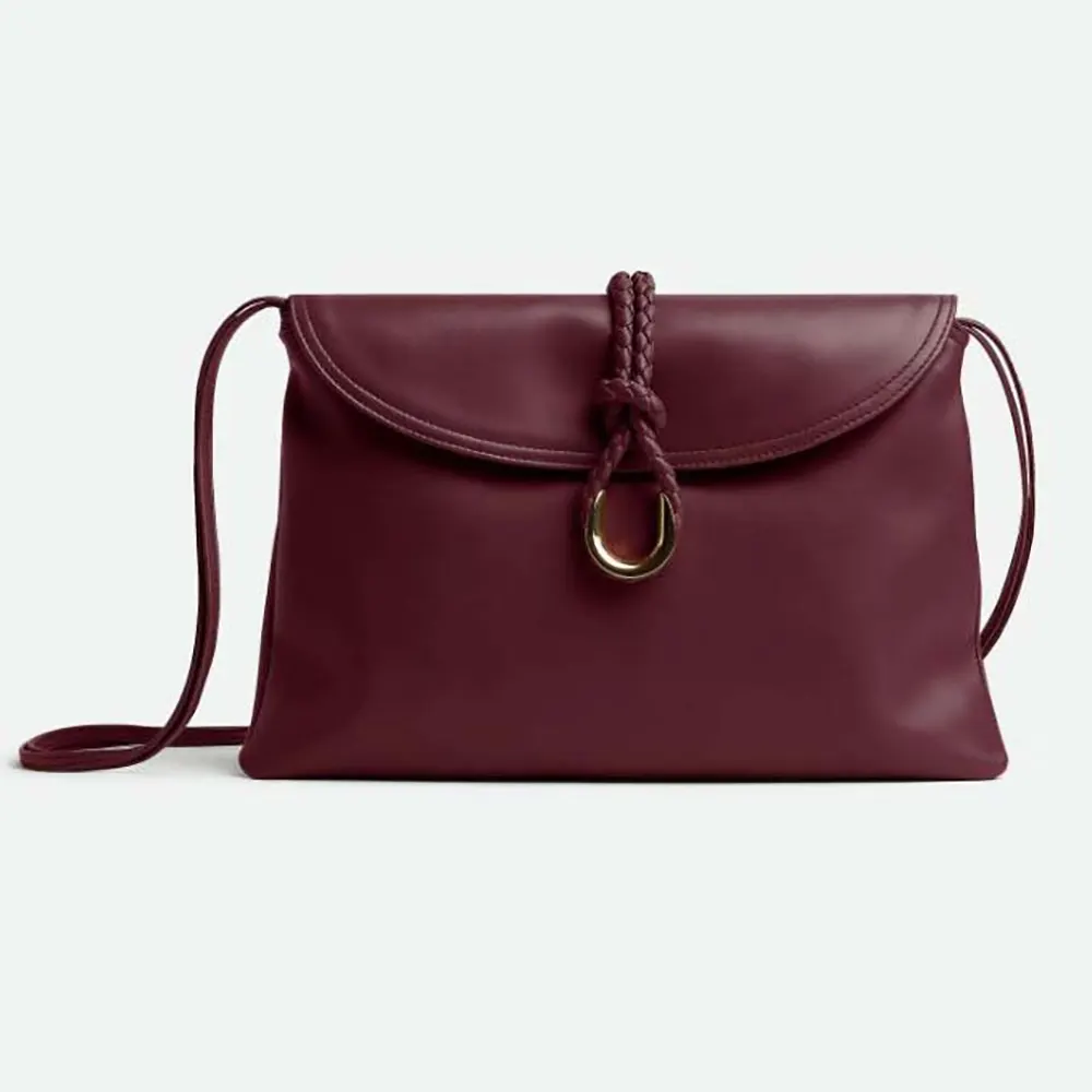 Front view of Bottega Veneta Women Liberta Cross-body Bag in Barolo maroon