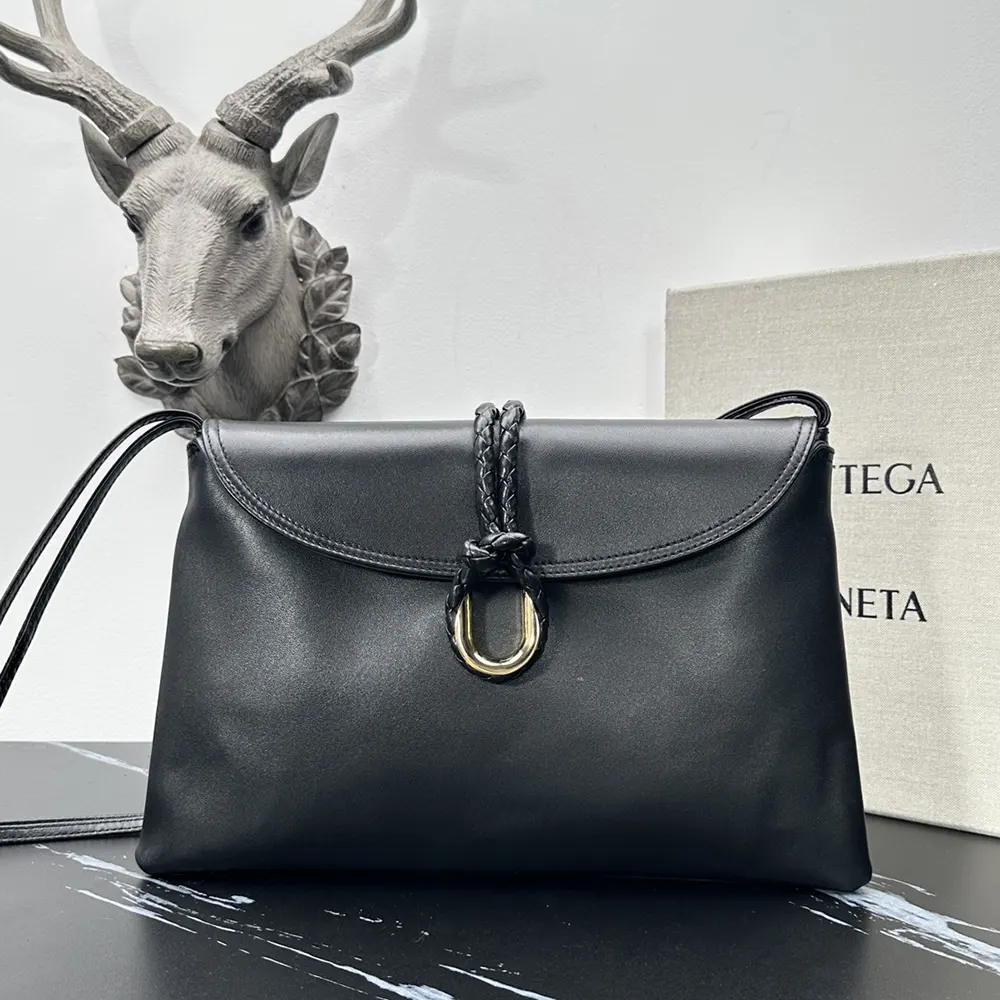 Close-up of polished metal hardware on Bottega Veneta Women Liberta Cross-body Bag