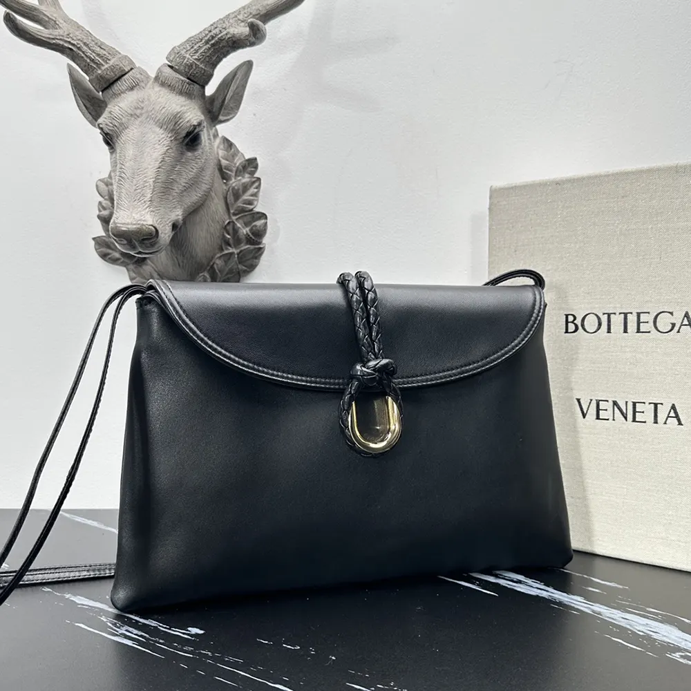Side angle showing sleek profile of Bottega Veneta Women Liberta Cross-body Bag