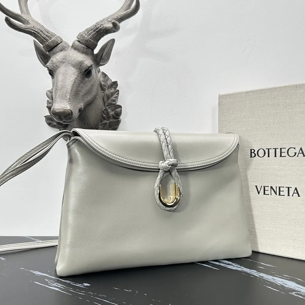 Side profile showing silhouette of Bottega Veneta Women Liberta Cross-body Bag