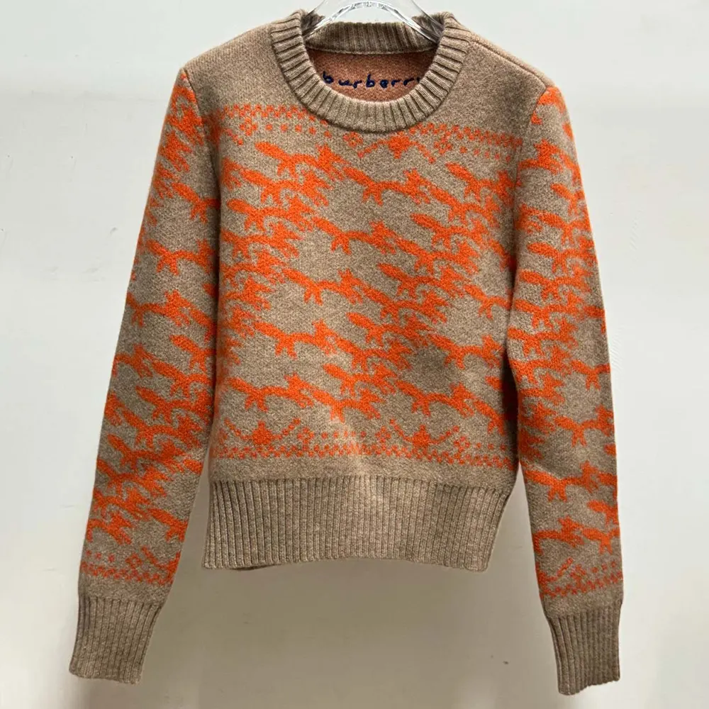 Side angle showing cropped fit of Burberry Men Cropped Fox Wool Sweater