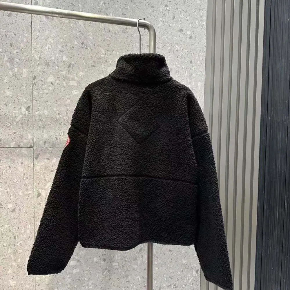Side angle showing silhouette and logo patch on Canada Goose Women Beige Simcoe Fleece Jacket-Black