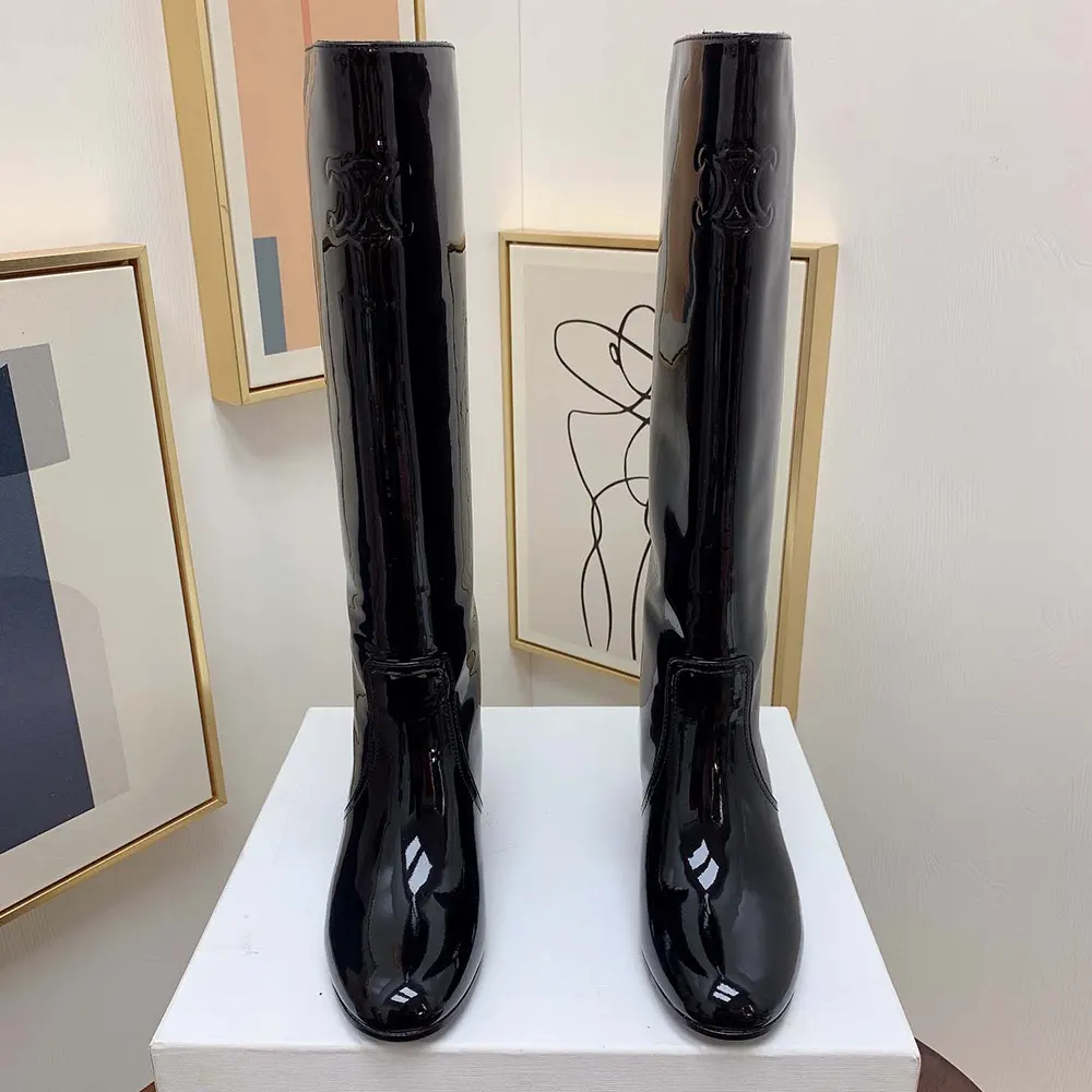 Front view showcasing glossy patent calfskin on Celine Women Les Bottes Celine Triomphe High Boot