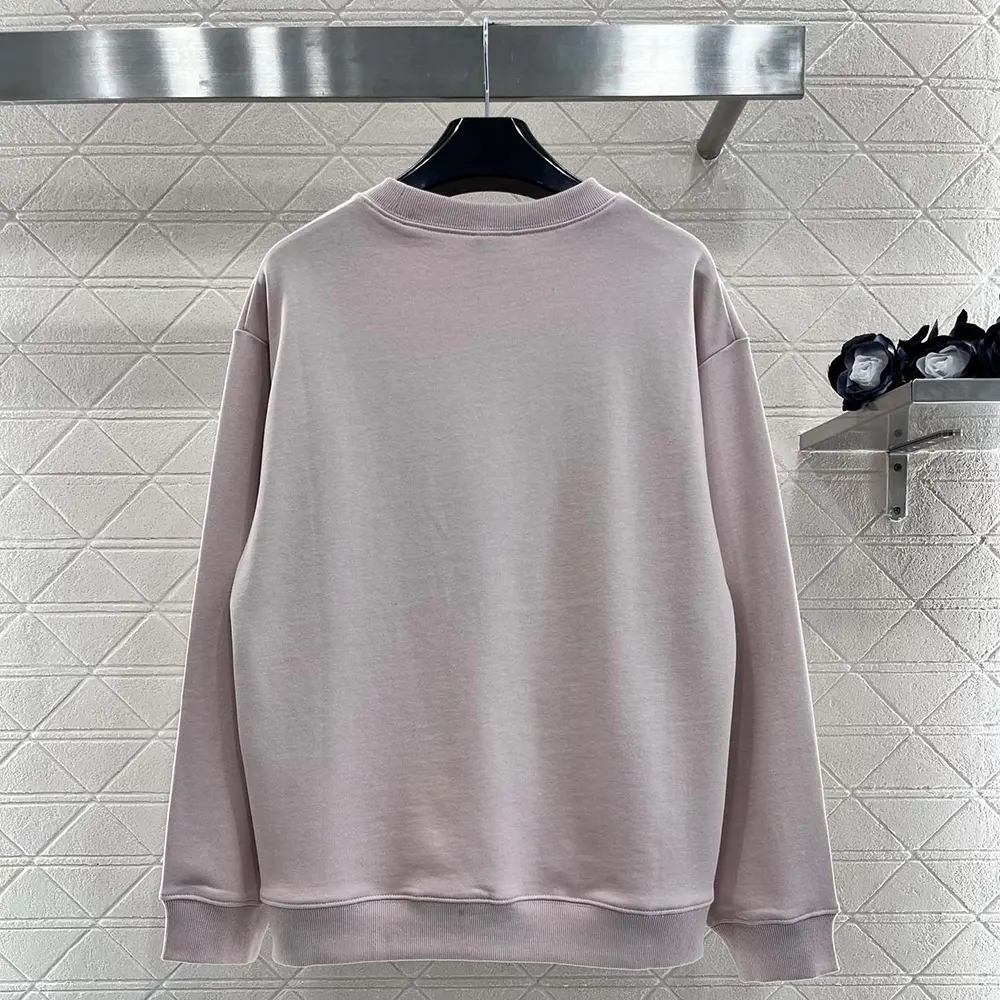 Side angle showing relaxed fit of Celine Men Oversized Celine Sweatshirt