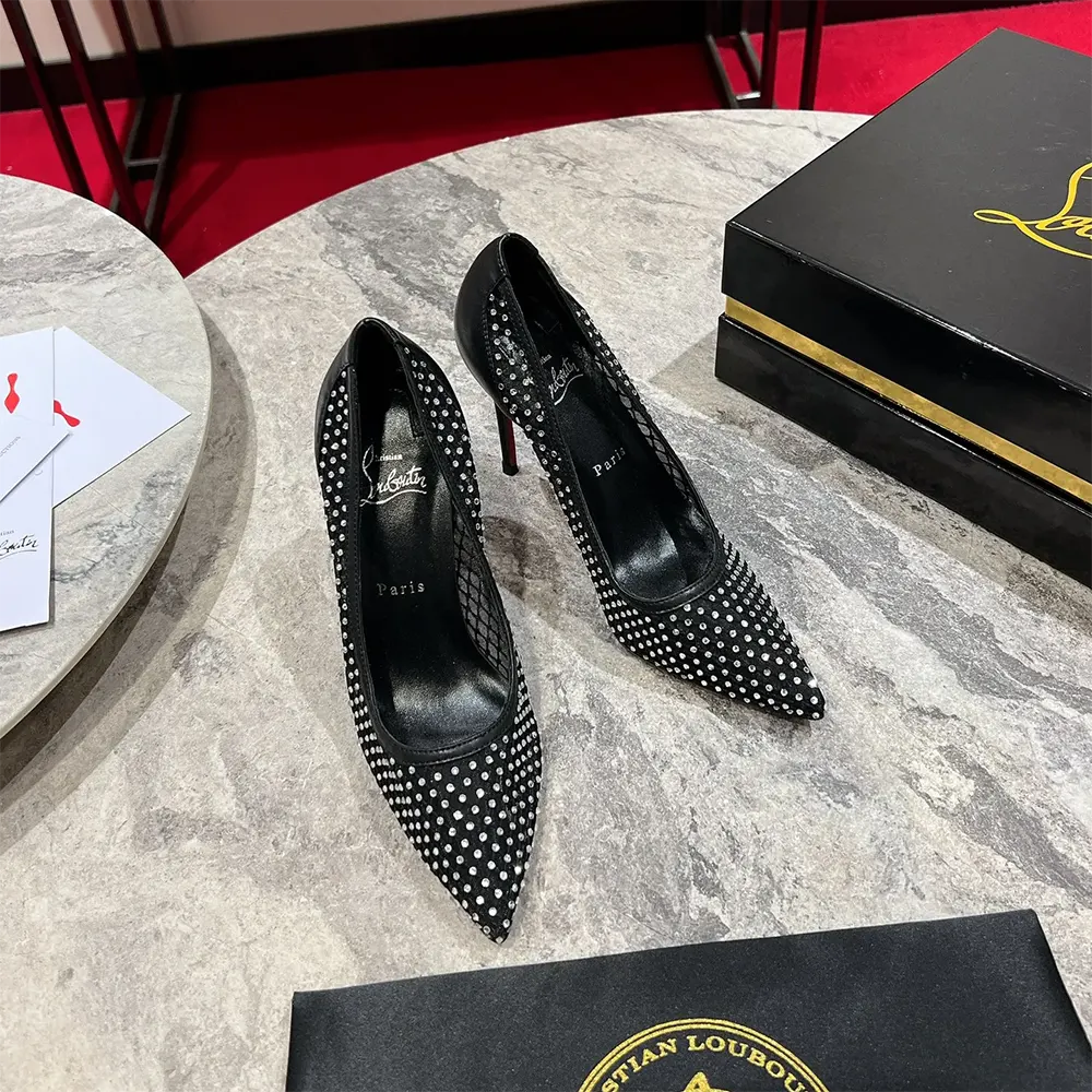 Close-up on strass detailing and mesh texture of Christian Louboutin pumps