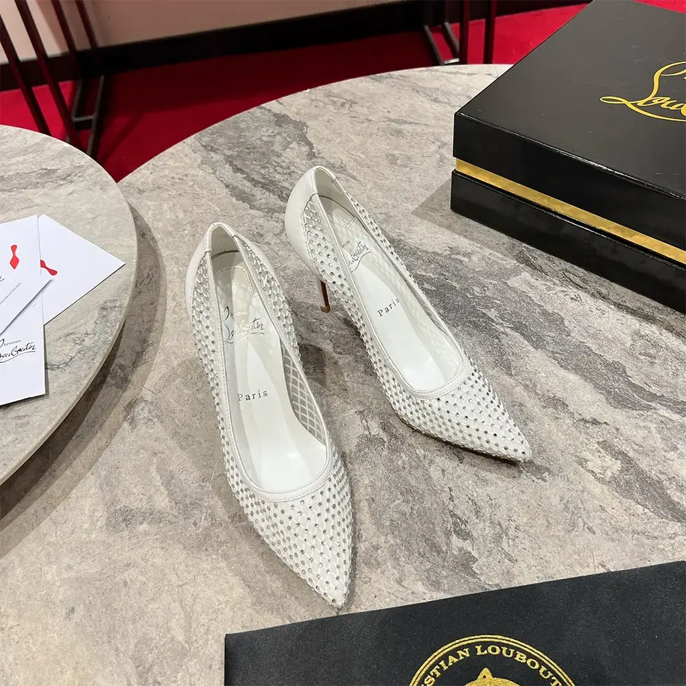 Top close-up showing strass crystals on Christian Louboutin Apostropha pumps
