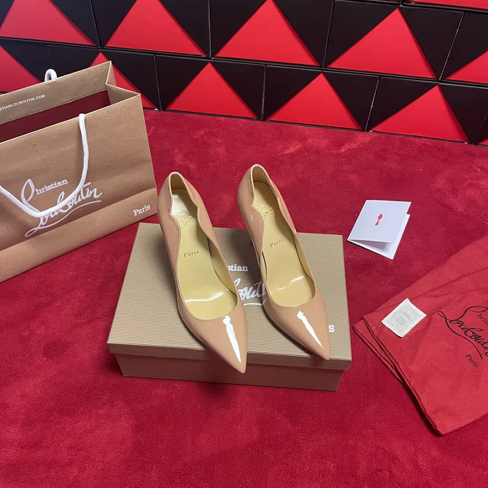 Close-up of signature red sole on Hot Chick 100 mm Pumps by Christian Louboutin