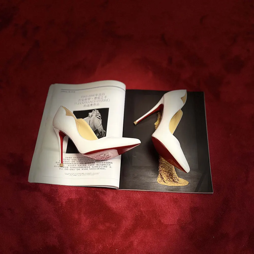 Top view highlighting smooth patent leather and slip-on design on Hot Chick Pumps