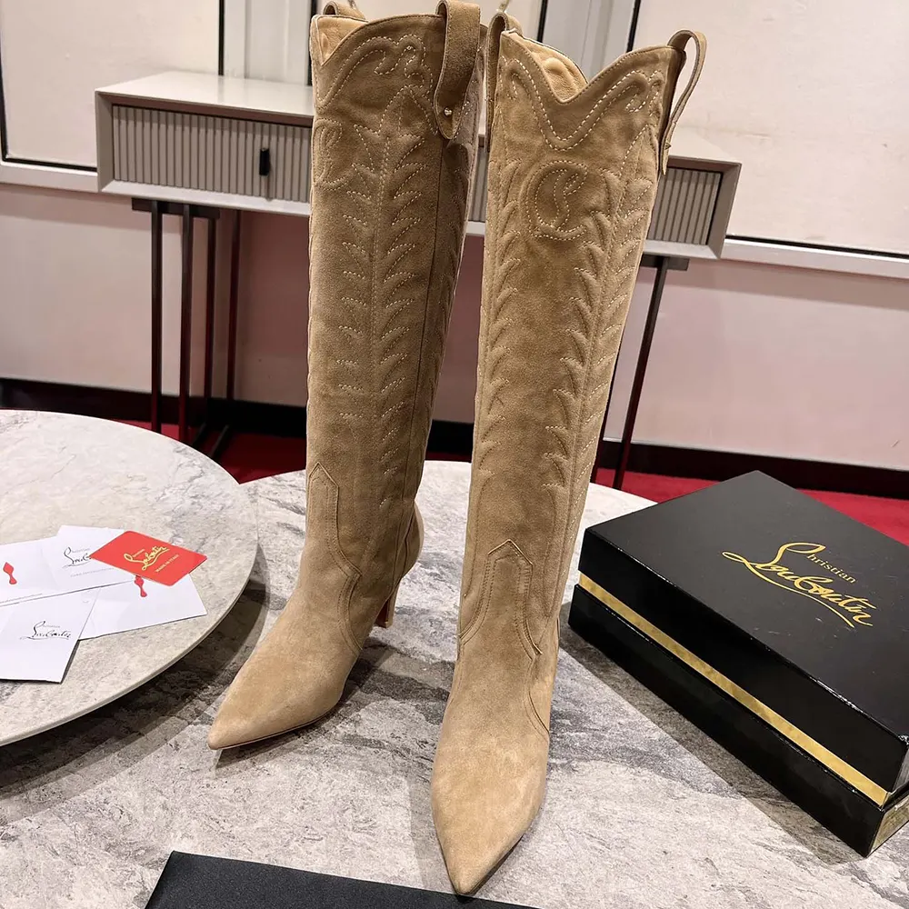 Close-up on the signature red sole of Christian Louboutin Women Santia Botta 85 mm Boots