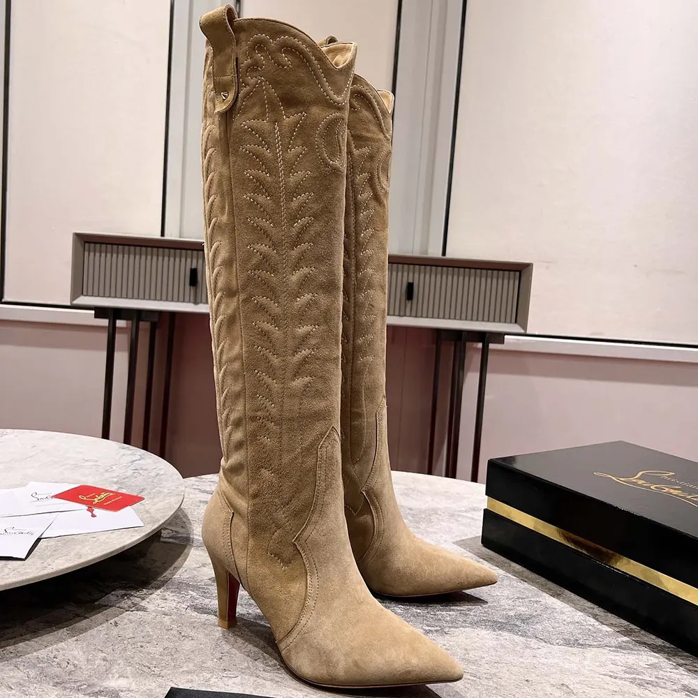 Detail of pointed toe and soft veau velours texture on Christian Louboutin Santia Botta boots
