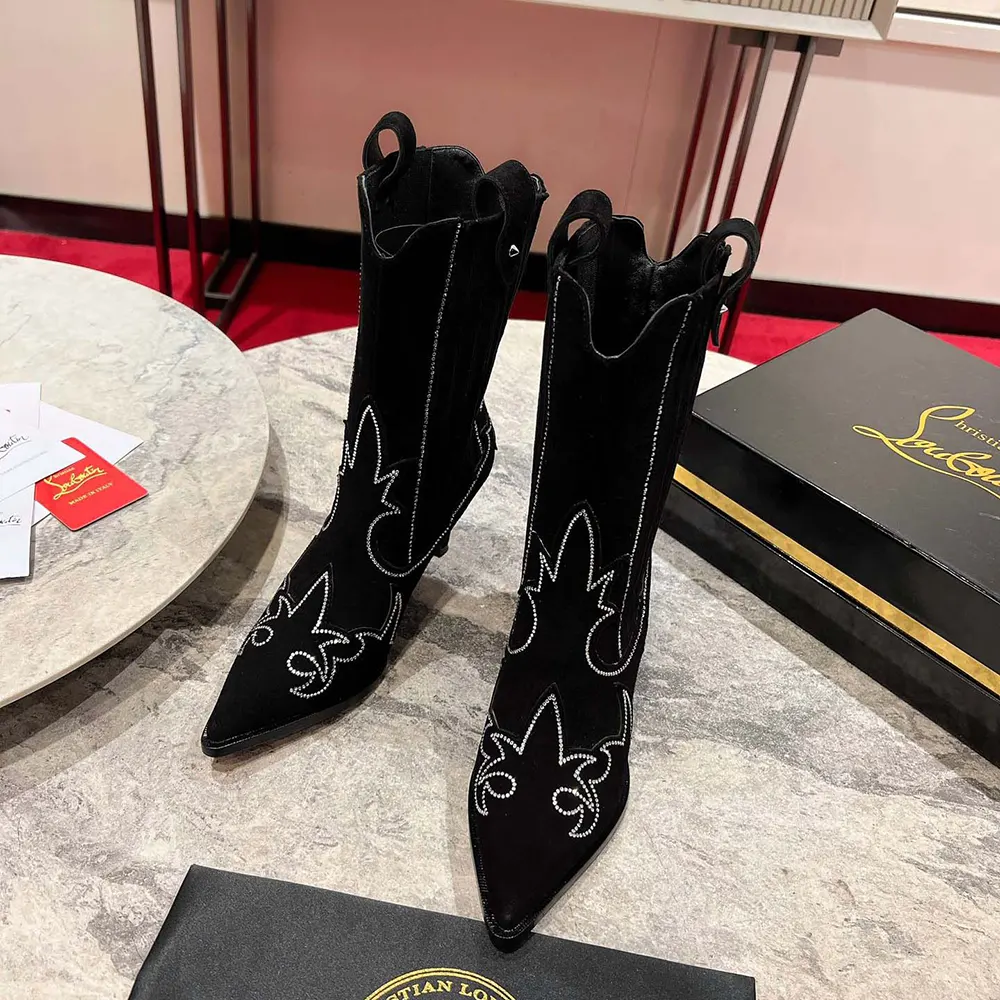 Close-up of strass crystal embellishments on Christian Louboutin Women Santigag Strass boots