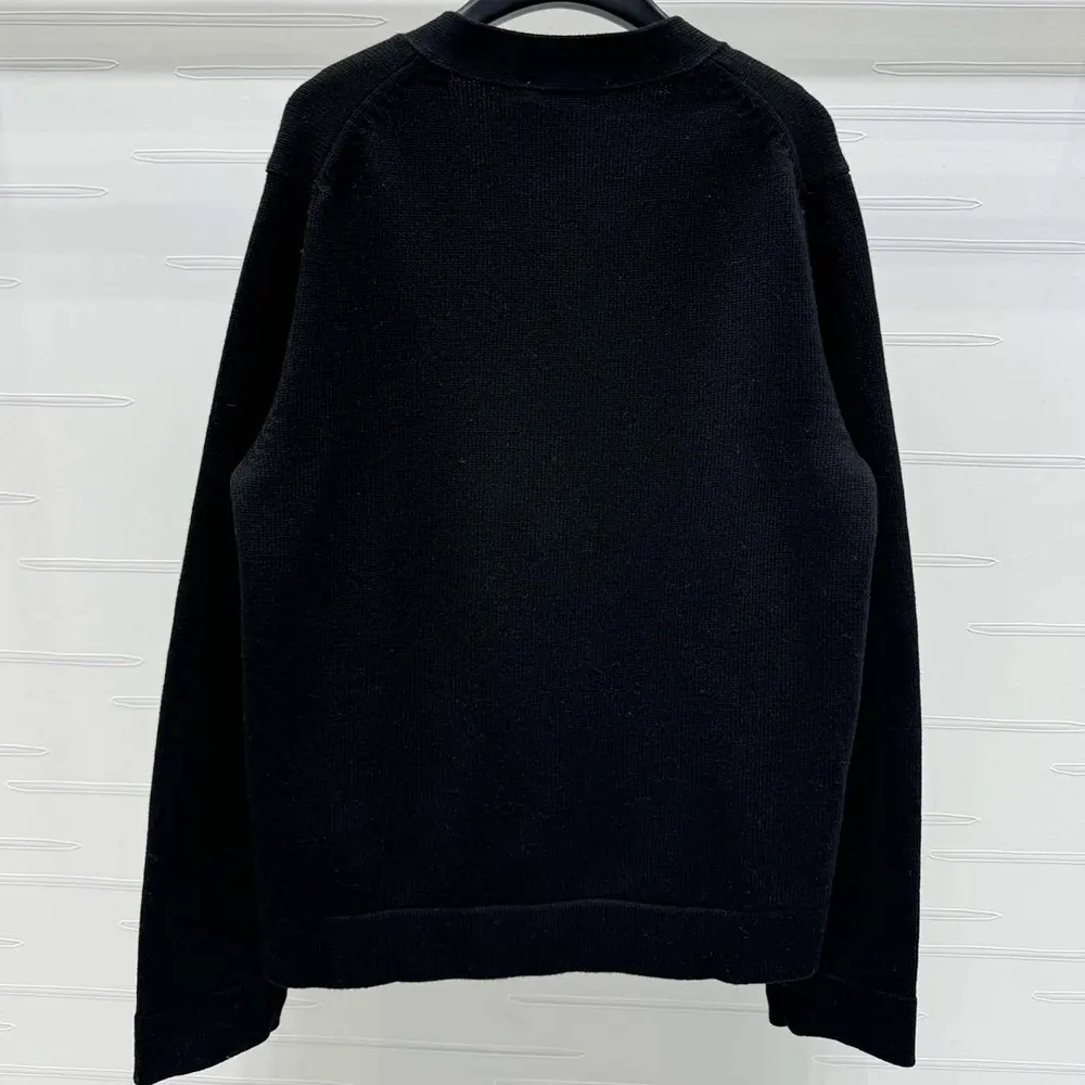 Side profile showing slim fit of Dior Women Christian Dior Couture Cardigan