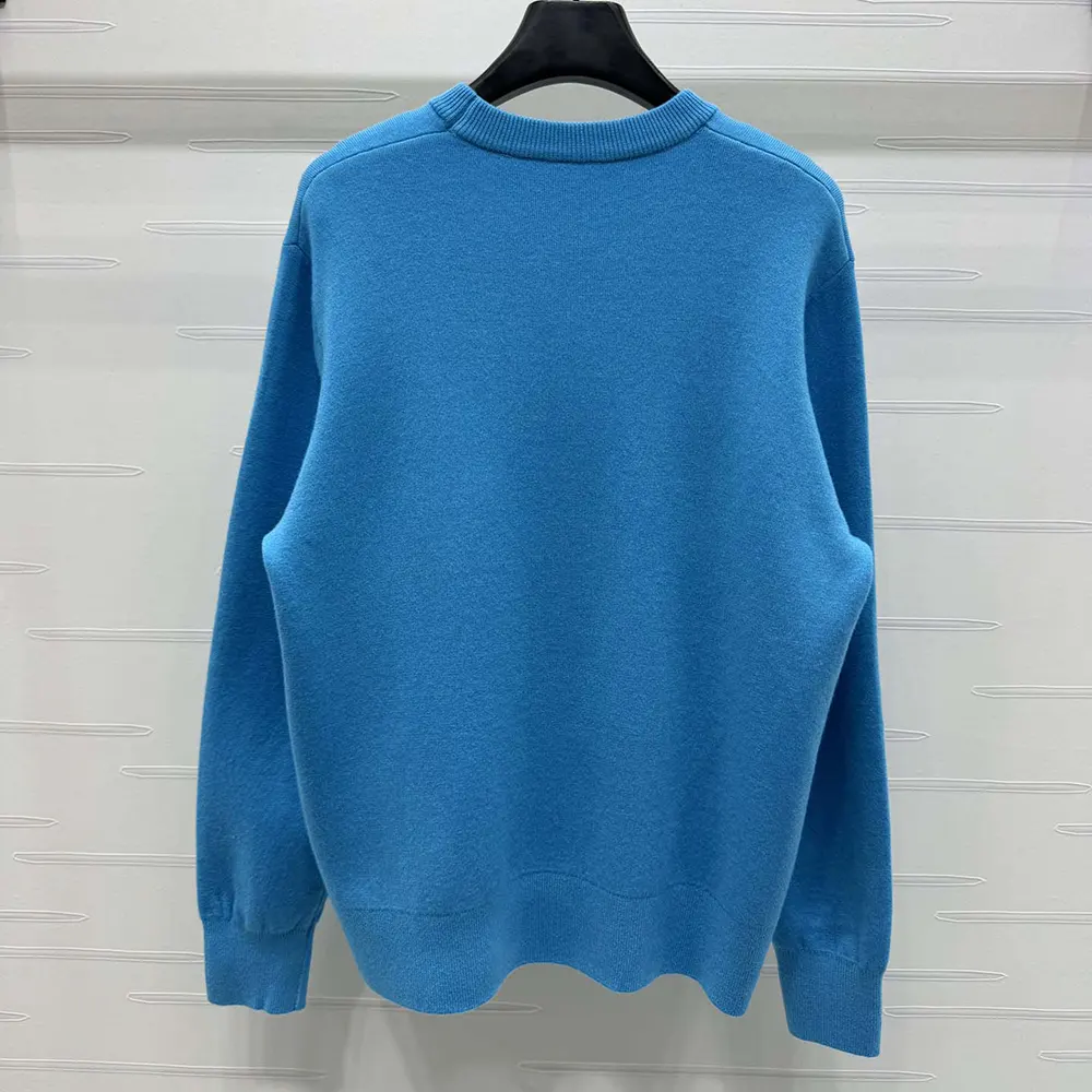 Side angle showing relaxed fit of Dior Women Christian Dior Couture Sweater