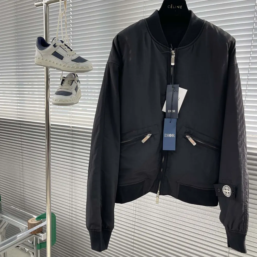 Close-up of Stone Island badge on sleeve of Dior Men DIOR AND STONE ISLAND Bomber Jacket