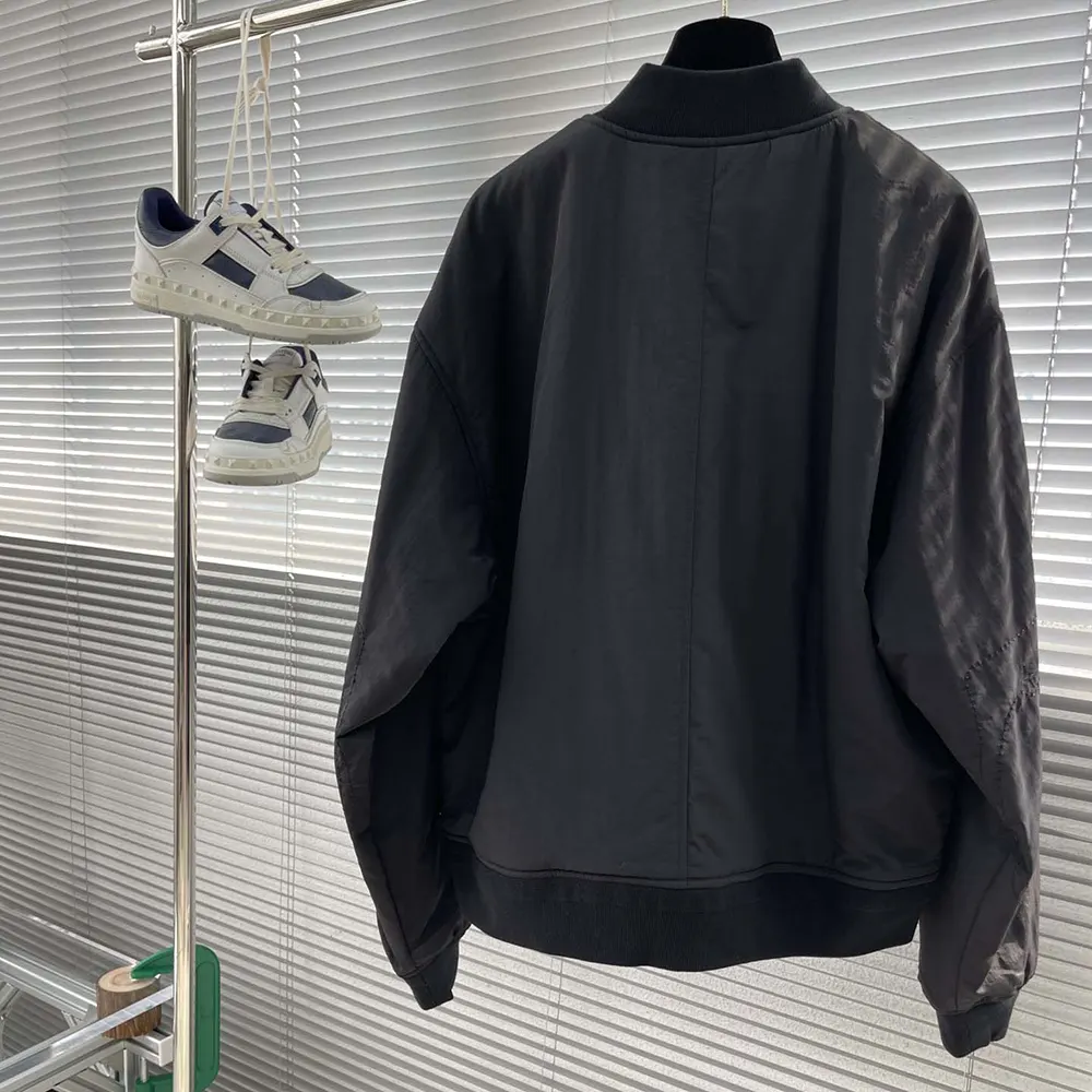 Back view showing silhouette of Dior Men DIOR AND STONE ISLAND Bomber Jacket Black Habotai Silk Blend