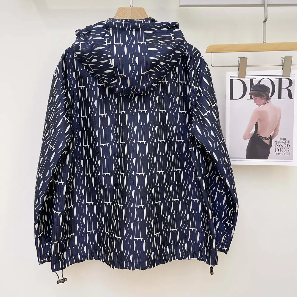 Side angle showing slim silhouette of Dior Men Waterproof Hooded Jacket