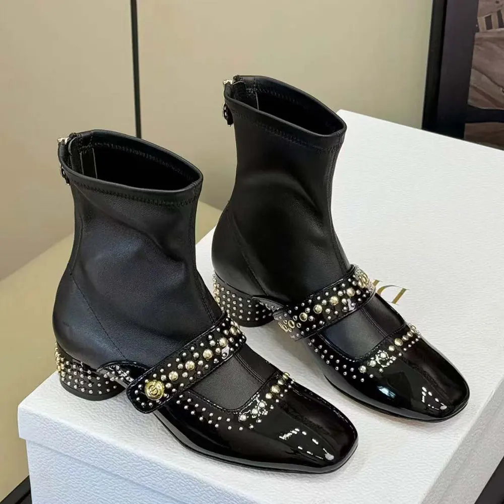 Close-up of signature 'D' metal heel on Dior Women Belle-D Boot