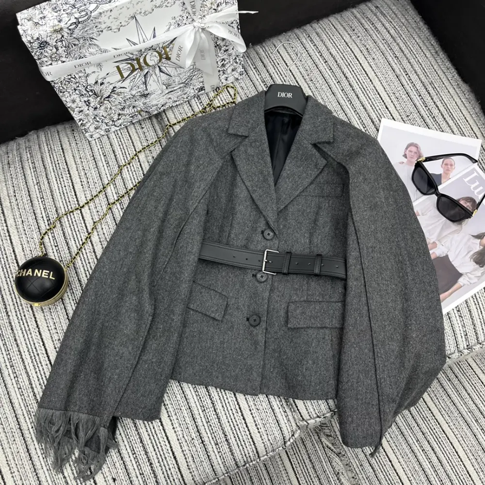 Close-up on gold buttons and texture of Dior Women Belted Jacket gray tweed