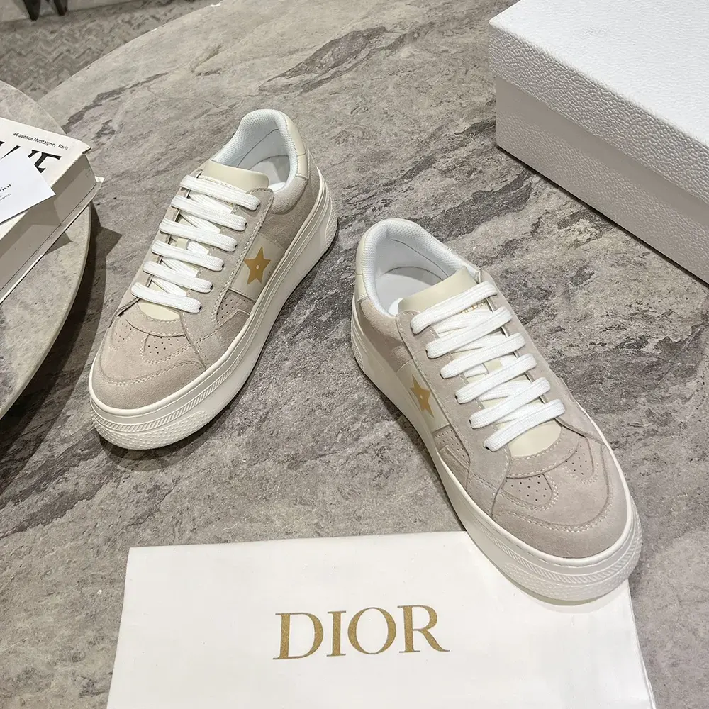 Top-down look at laces and suede texture of Dior Star Platform Sneaker