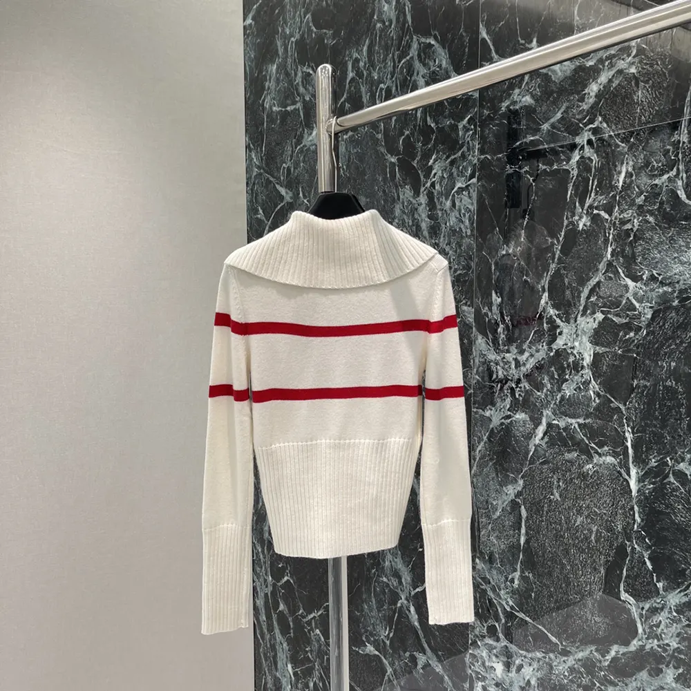 Side angle showing silhouette of Dior Women DiorAlps White Sweater