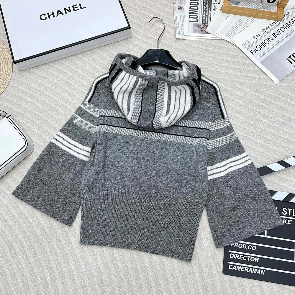 Side profile showing three-quarter sleeve on Dior Women DiorAlps Hooded Sweater