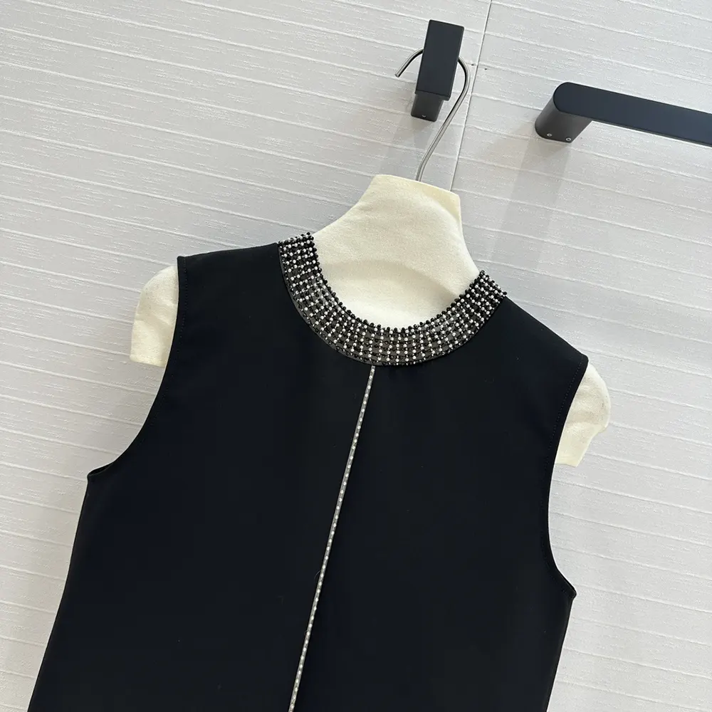 Side angle showing silhouette of Dior Women Embroidered Top