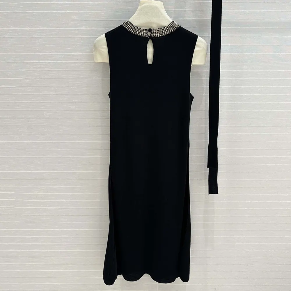 Side angle showing silhouette of Dior Women Embroidered Tunic Black Silk Ribbed Knit