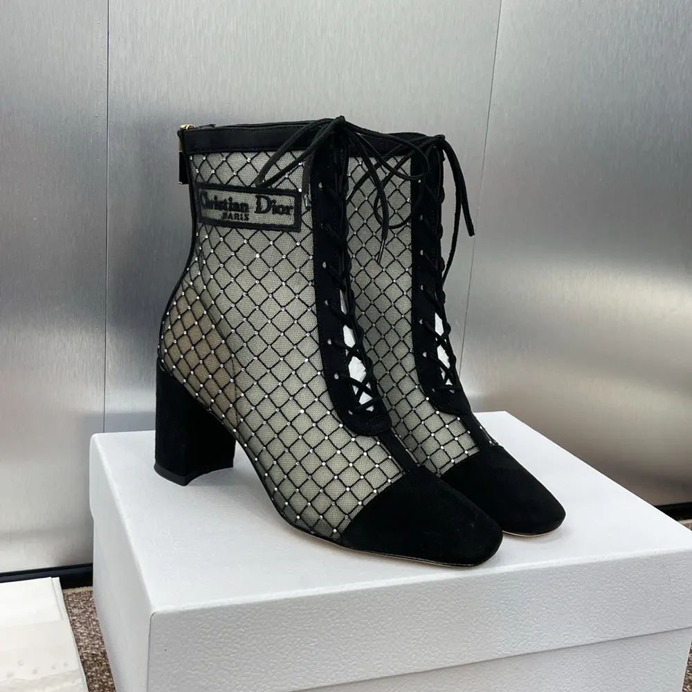 Close-up of embroidered detail on Dior Women Naughtily-D ankle boot