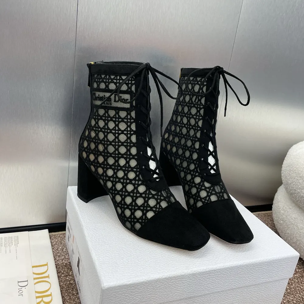 Rear angle showing sculpted heel of Dior Women Naughtily-D Heeled Ankle Boot