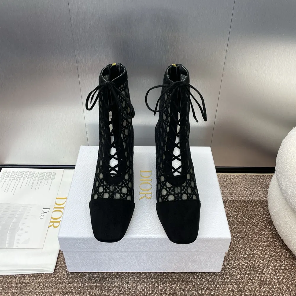Close-up of transparent mesh and embroidered black Cannage motif on Dior boot