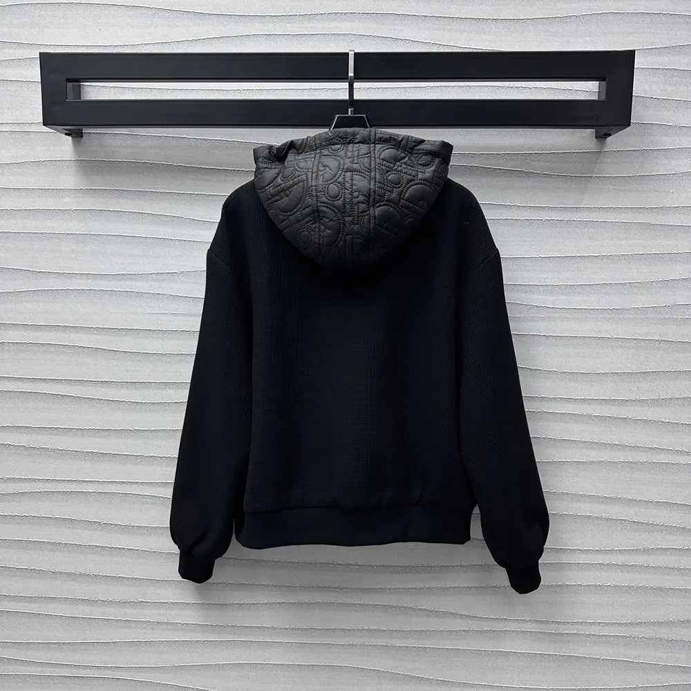 Side profile showing silhouette and hood detail of Dior Men Oblique Hooded Blouson Jacket