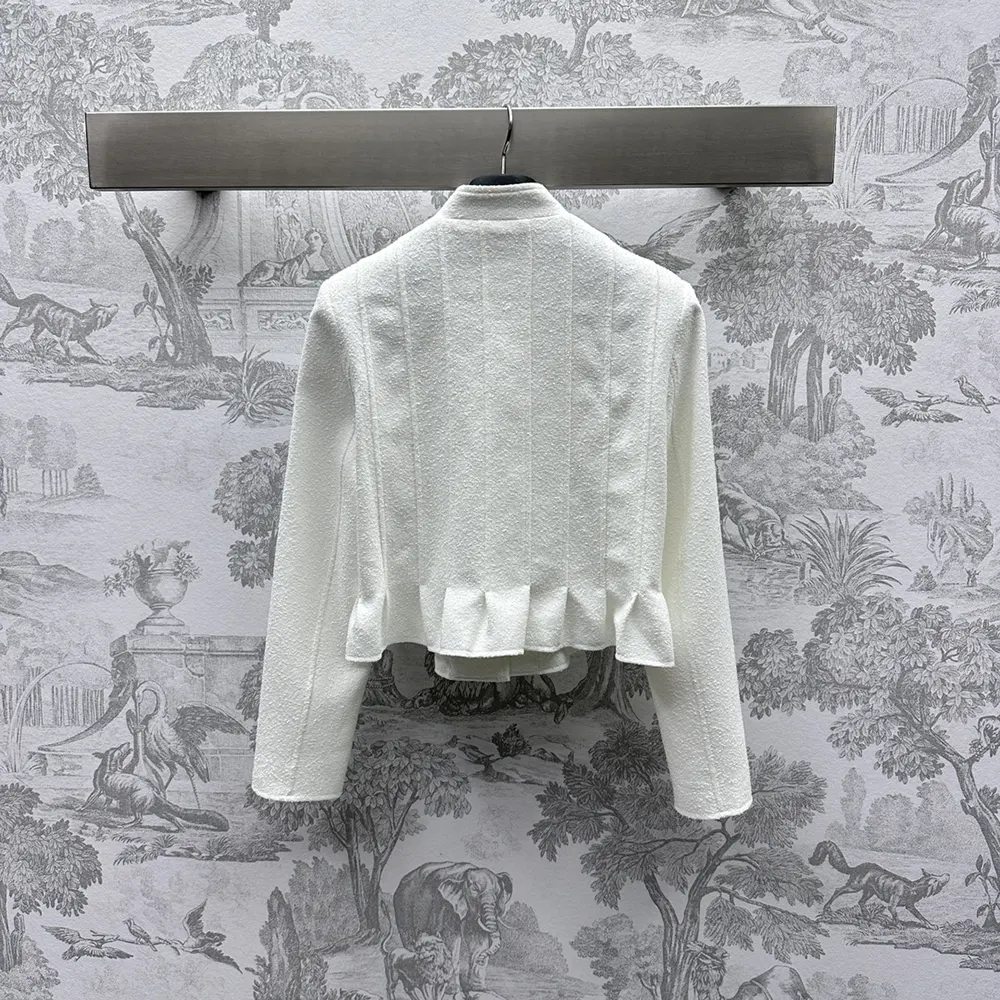Side angle showing fitted peplum silhouette of Dior Women Peplum Jacket
