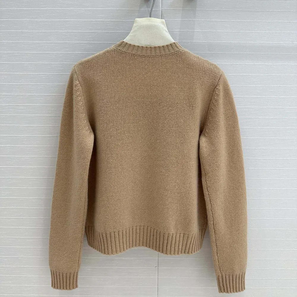 Side angle showcasing ribbed hem on Dior Women Sweater Pale Pink Cashmere and Silk Knit