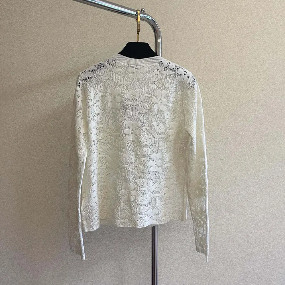 Side angle showing tailored fit of Dior Women Twinset Ecru Mohair and Alpaca Blend Lace