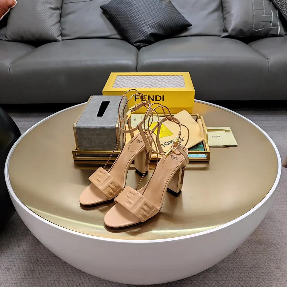 Close-up of FF logo metal hardware on Fendi Women Delfina Beige sandals