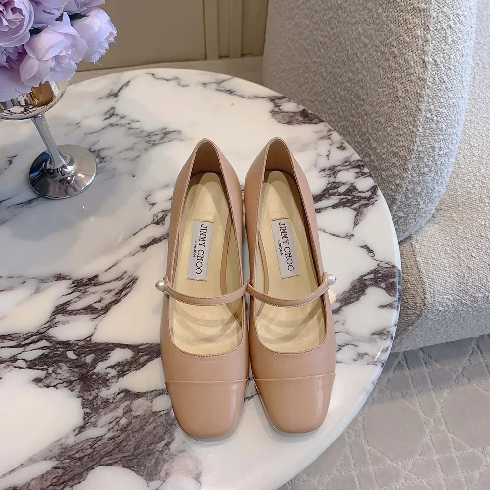 Close-up on pointed toe of Jimmy Choo Women Elisa 45 Ballet Pink Pumps