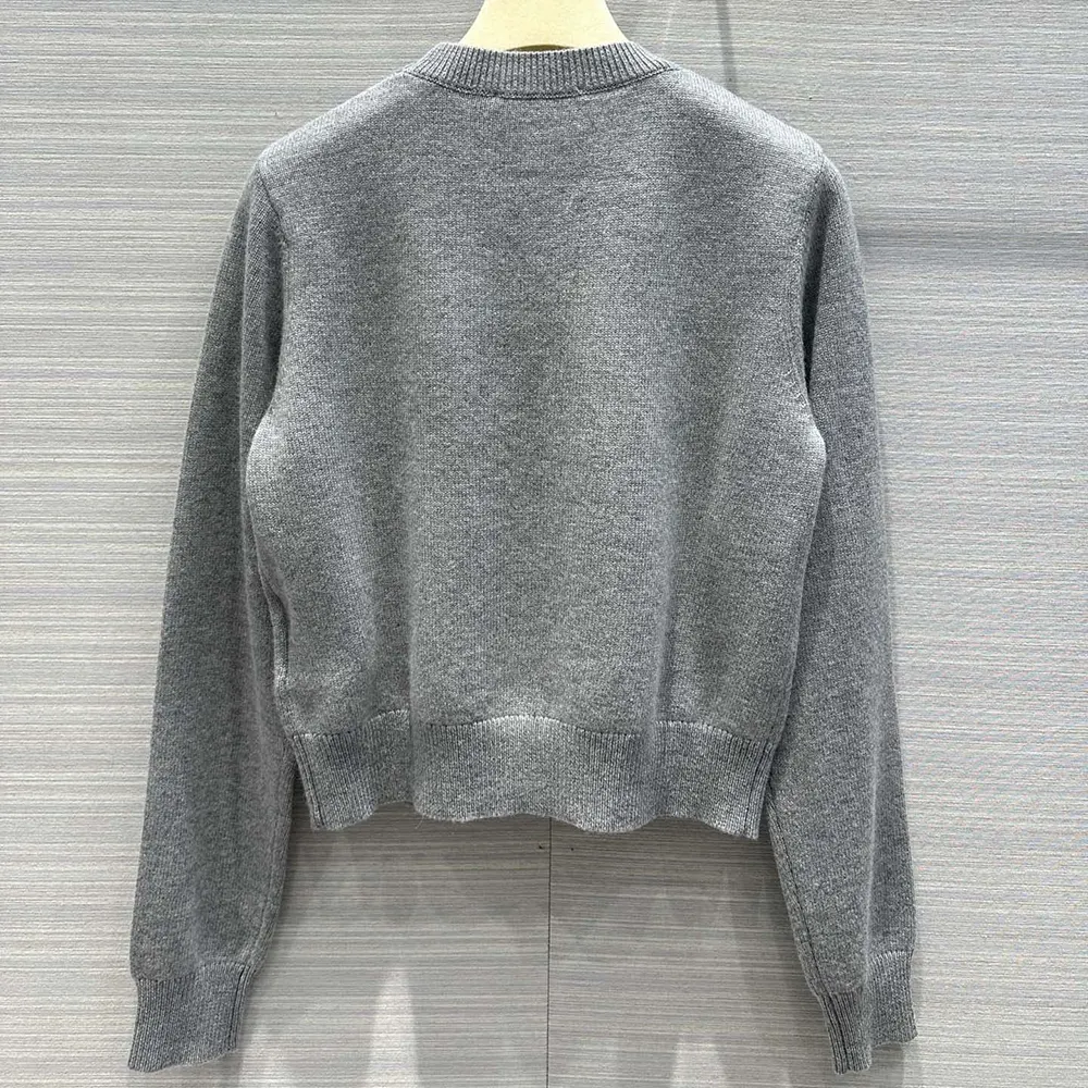 Side angle showing silhouette of Miu Miu Women Cashmere Sweater
